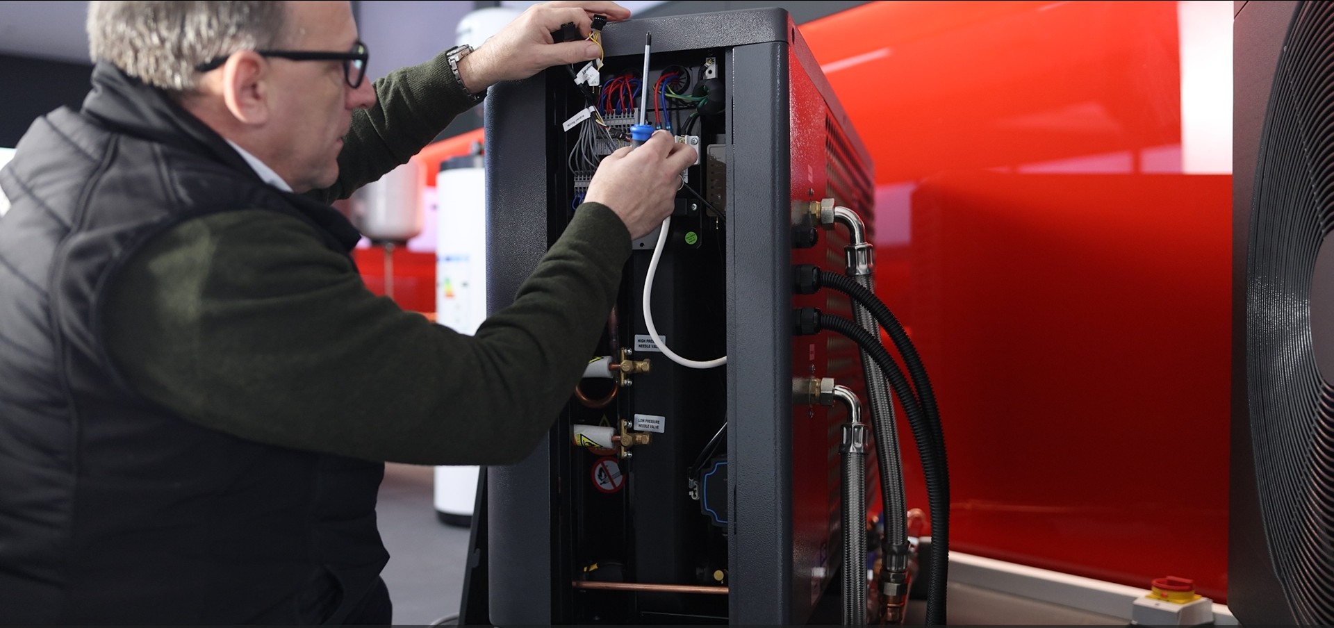 Installer working with equipment